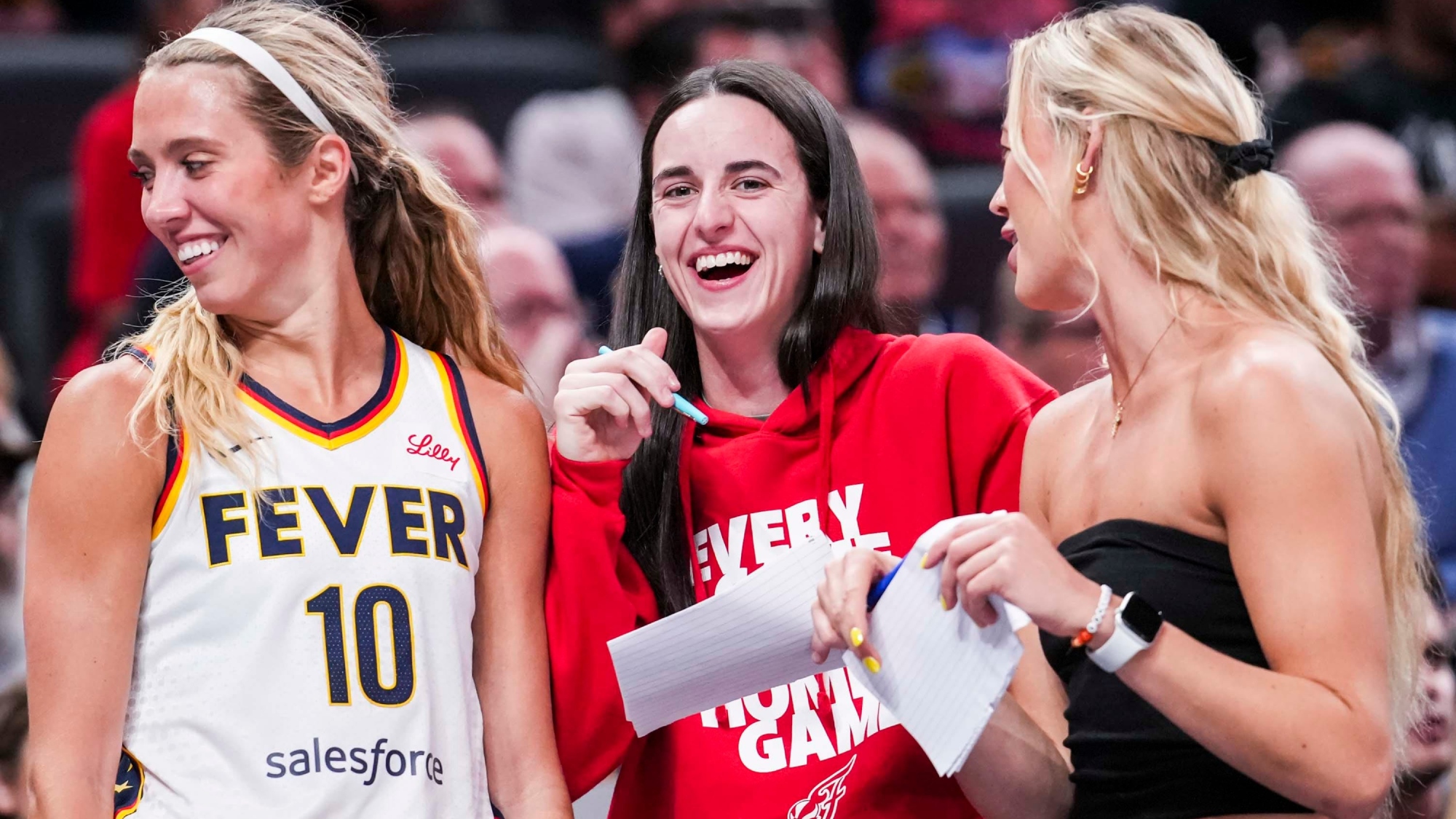 Indiana Fever guard Caitlin Clark talks to teammates during the third quarter against the Golden State Valkyries