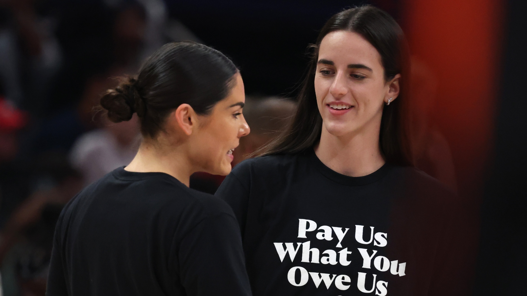 Kelsey Plum and Caitlin Clark