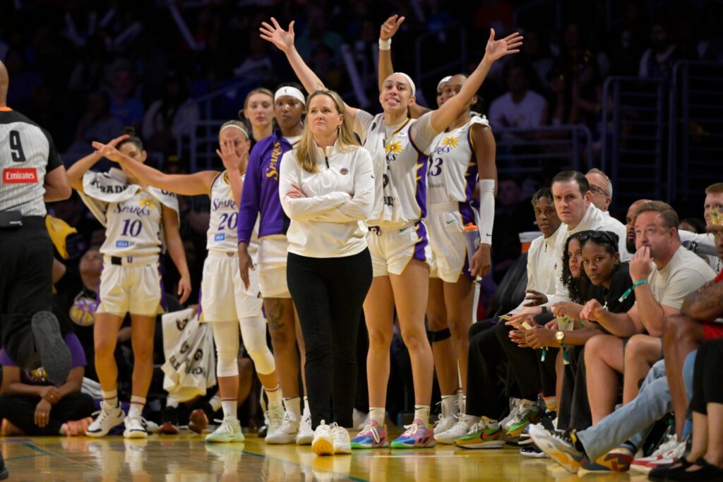 Los Angeles Sparks' Coach Lynne Roberts with Team