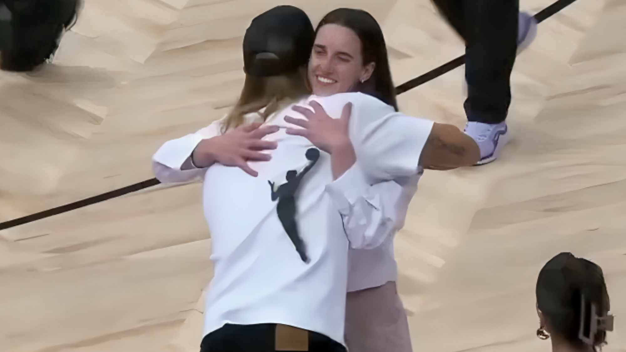 Cameras Caught Caitlin Clark's Sideline Moment With NFL Star George Kittle During Indiana Fever Game