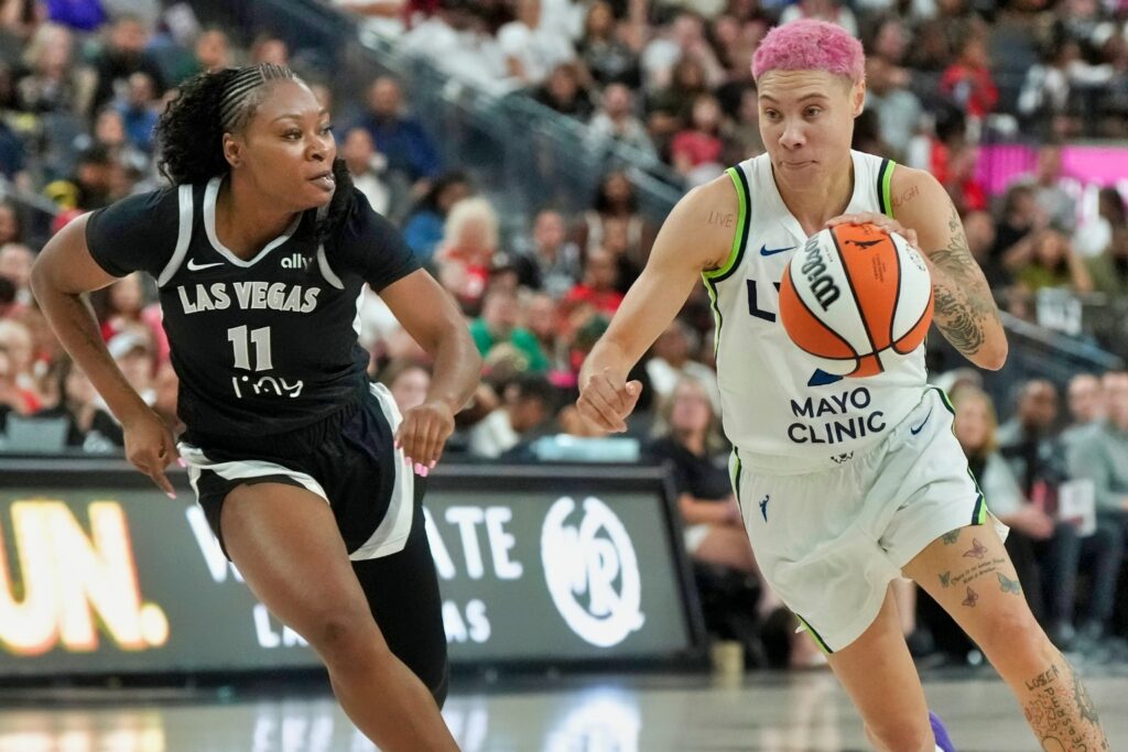 Las Vegas Aces Guard Dana Evans and Minnesota Lynx Guard Natisha Hiedeman