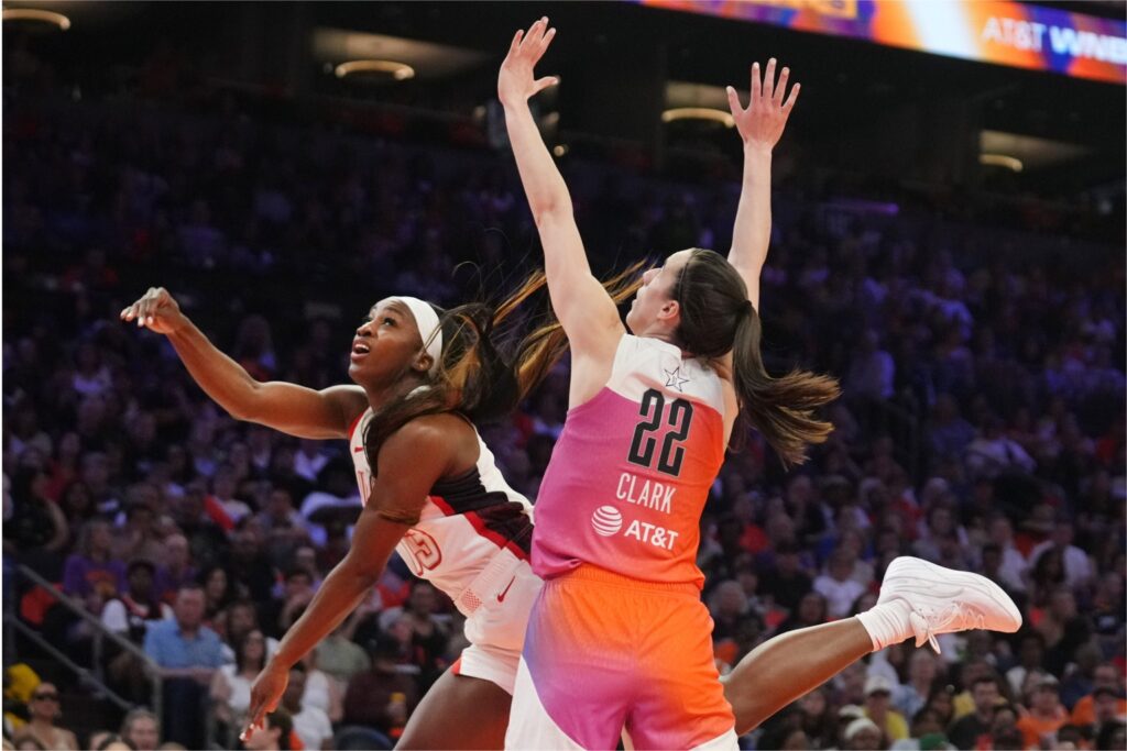 Jackie Young and Caitlin Clark