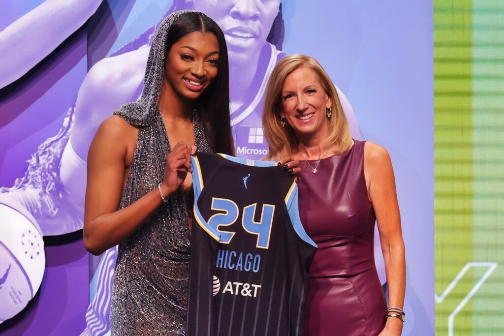 Angel Reese Poses With WNBA Commissioner Cathy Engelbert After She Is Selected With the Number Seven Overall Pick to the Chicago Sky in the 2024 WNBA Draft