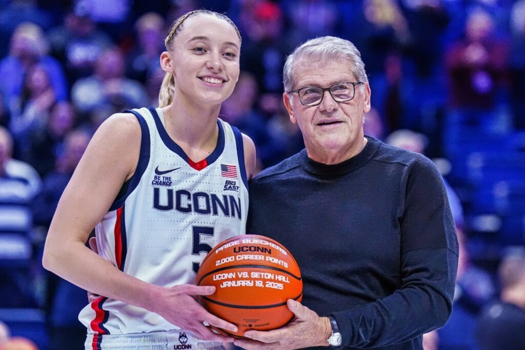 Paige Bueckers and Geno Auriemma