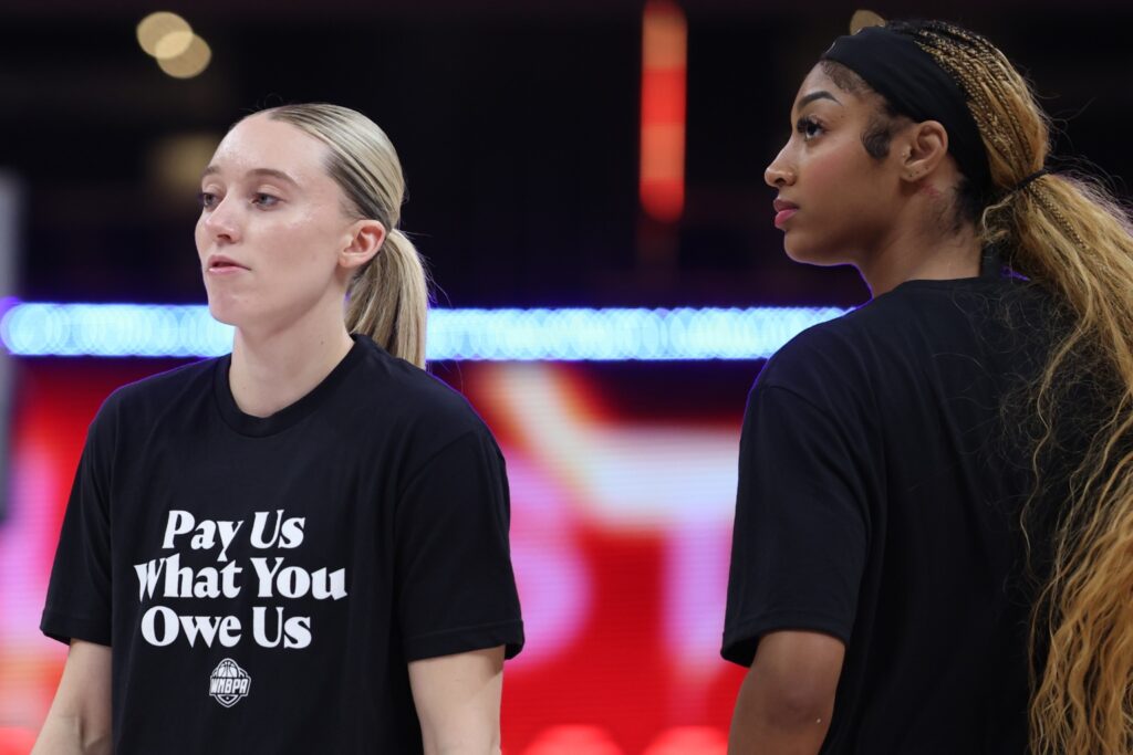 Paige Bueckers and Angel Reese