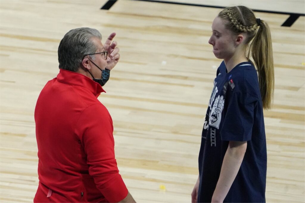 Paige Bueckers and Geno Auriemma