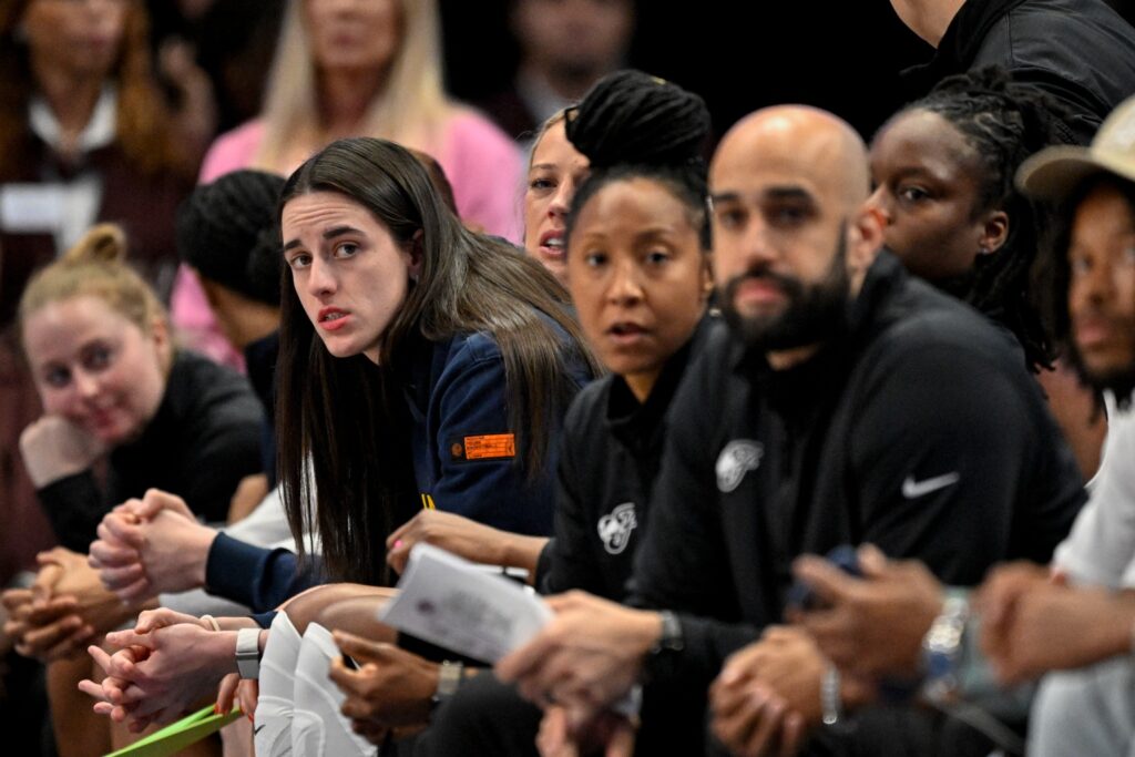 Caitlin Clark, Briann January and Austin Kelly
