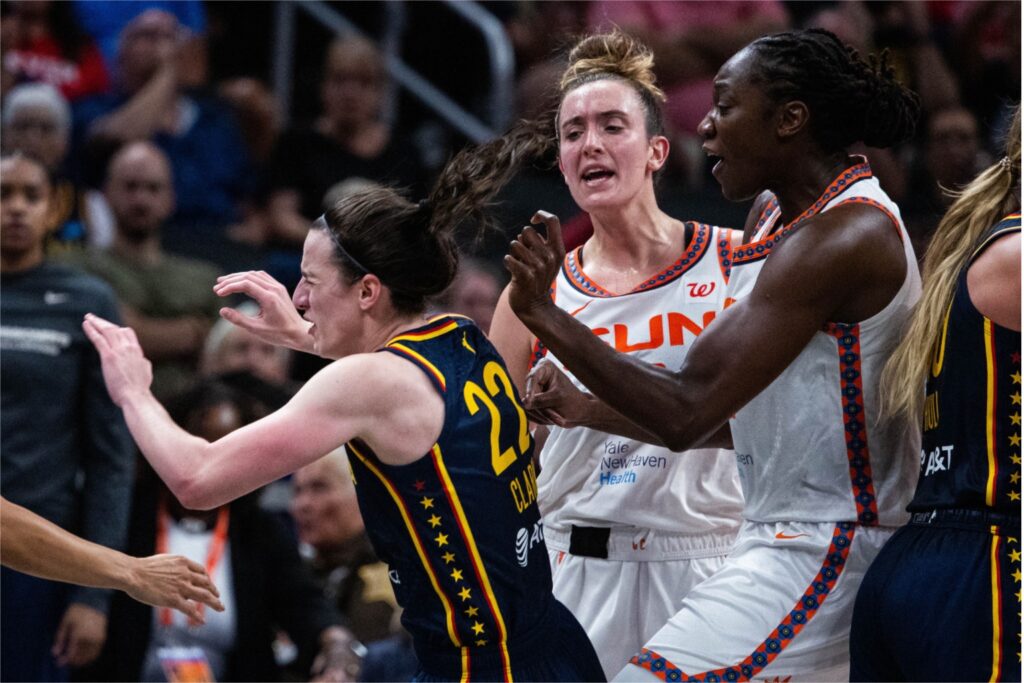 Caitlin Clark, Marina Mabrey and Tina Charles