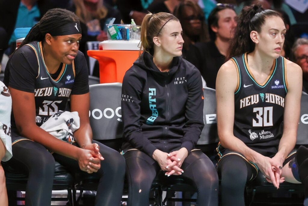 Jonquel Jones, Sabrina Ionescua and Breanna Stewart